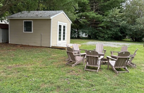 Mascot House | Walk to town from this cozy Rivah house with awesome yard and water views.