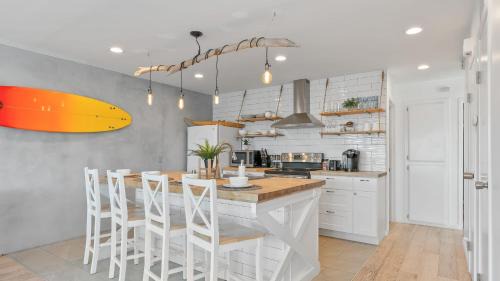 San Clemente House | Walk to Trestles Beach Duplex w Ocean View El Camino Surfhouse by AvantStay