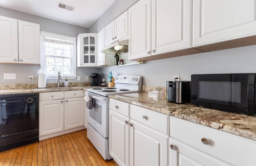 Eastport House | Walkable Eastport Home with Firepit, Porch & Fenced-in Yard
