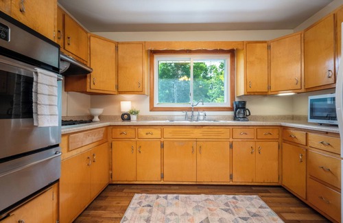 Balsam Lake House | Walking distance to public beach, boat landing, and downtown Balsam Lake