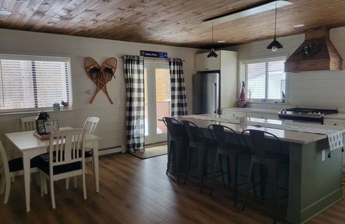 Thompsonville House | Walking distance to four-season ski and golf resort Crystal Mountain