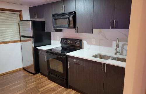 Southwest Calgary Apartment | Walkout basement 5mins to water park.