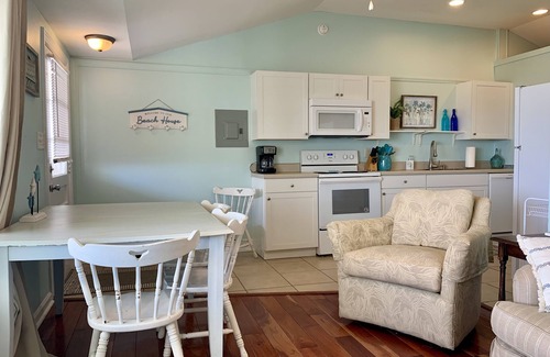 Topsail Beach House | Wall Cottage- North. Cozy oceanfront duplex with covered deck and ocean views