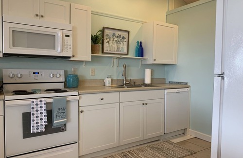 Topsail Beach House | Wall Cottage- North. Cozy oceanfront duplex with covered deck and ocean views