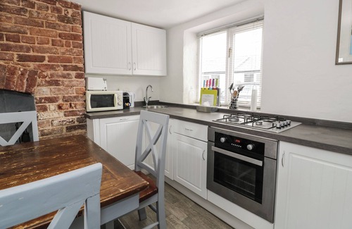 Hendrerwydd Cottage | WALLED GARDEN COTTAGE, pet friendly, with hot tub in Denbigh