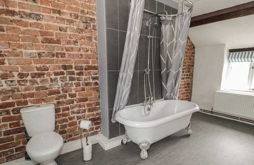 Hendrerwydd Cottage | WALLED GARDEN COTTAGE, pet friendly, with hot tub in Denbigh