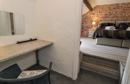 Hendrerwydd Cottage | WALLED GARDEN COTTAGE, pet friendly, with hot tub in Denbigh