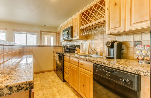 Southwest Colorado Springs Apartment | WALLS OF GLASS! Mountain top apartment, panoramic mt. views and city lights.