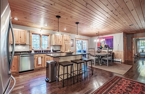 Bethel House | Wapiti Lodge - Gorgeous Log Home with fireplace and private yard nestled under tall pines!