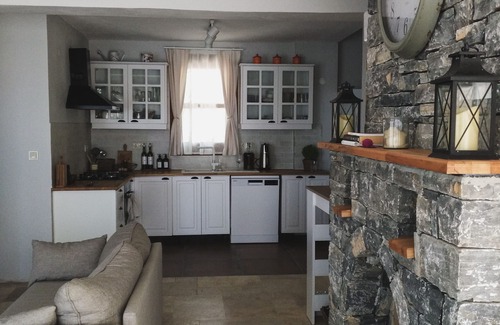 Marmaris City Center Villa | Warm, quiet stone house with sea views and breathtaking sunsets.