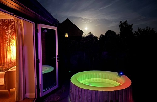 Taunton House | Warm up with a sauna, hot tub and games