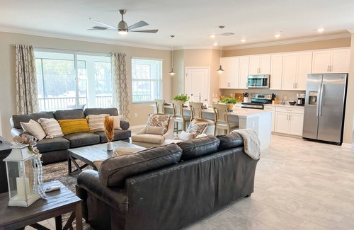 Ave Maria House | Warm weather year round in brand new coach home with optional golf