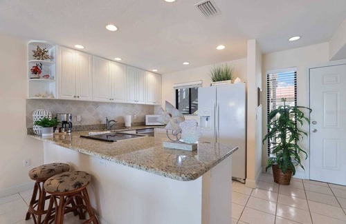 Bradenton Beach Condo | Watch dolphins & pelicans from this 2 bedroom/2 bath waterfront condo.