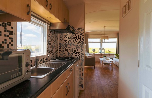 Westerland Ski Chalet | Watch the sun sink into the sea from your living room at Chalet WadRust