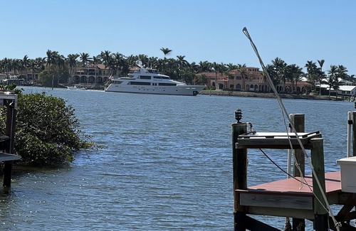 Royal Harbor Apartment | Watch the yachts roll on by, looking at the beautiful sunset sky