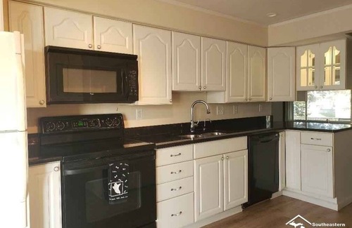 Estral Beach House | Waterfront 4 bedroom two full bath with arcade, kayaks and dock.