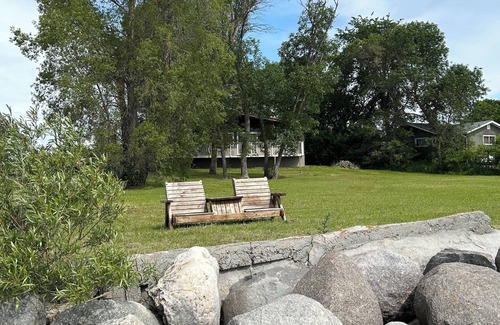 Saint Ambroise Cottage | Water's Edge cedar cabin on 1 acre lakefront: a perfect retreat summer or winter