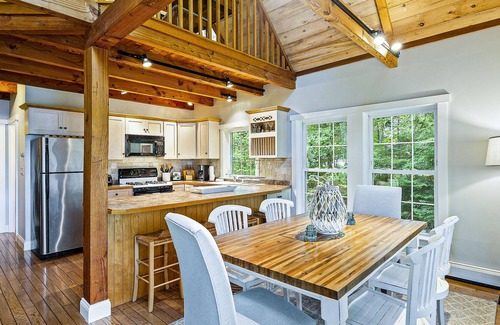 Eddington House | Water-view home with dock, fireplace, central AC & washer/dryer - dog-friendly