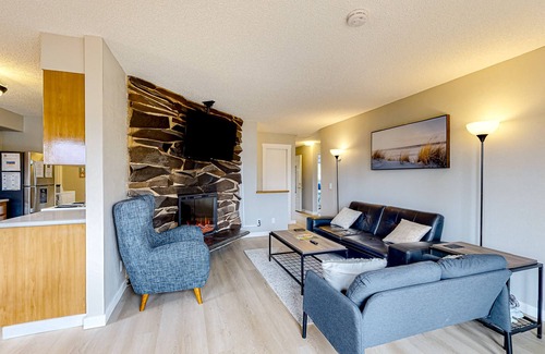 Bay City House | Water view retreat with scenic deck, grill, yard, fireplace, board games, & W/D