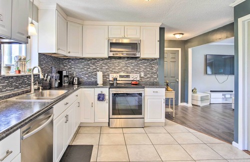 Waterbury Cottage | Waterbury Home: Playground & Porch Swing