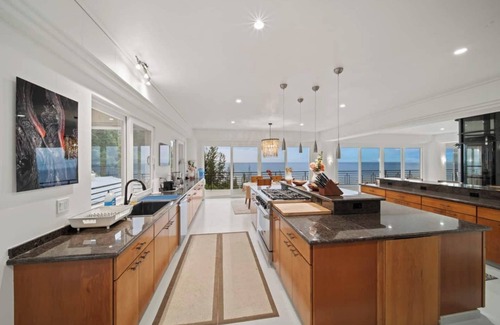 Ninole House | Waterfalling Estate is an oceanfront compound on the Big Island unlike any other