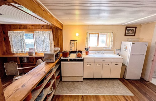 Wells Cottage | Waterfront 2BR cottage, beach, dock, lake views, fishing, wifi, partial A/C