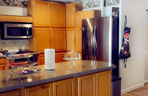 Rio Hondo House | Waterfront 4 bedroom cabin with a great location for fishing in its backyard.