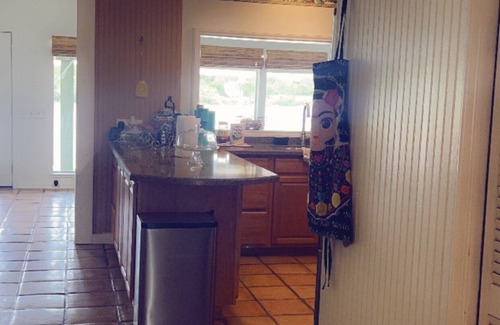 Rio Hondo House | Waterfront 4 bedroom cabin with a great location for fishing in its backyard.