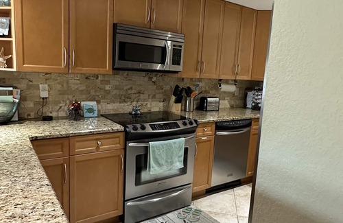 Capri Isle Condo | Waterfront and Spacious First Floor Condo!