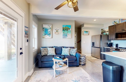 Colington Harbour Apartment | Waterfront apartment with lovely bay views, outdoor shower & fishing access