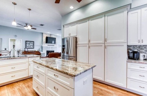 Tropic House | Waterfront Beauty: Sleeps 15, Heated Pool, Private Dock, Near Beach