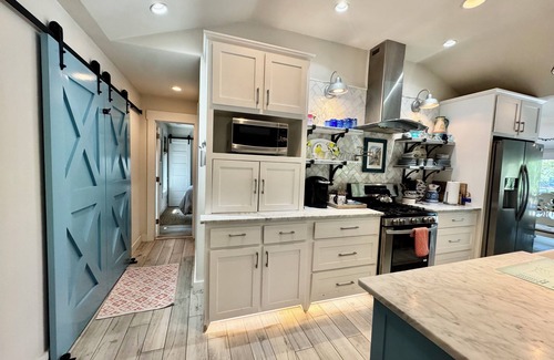 Vinita House | Waterfront beauty with dock and fireplace! Check in Bay! New Hot Tub!