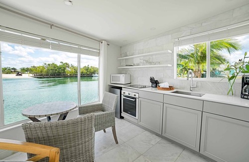 Nokomis House | Waterfront Boathouse One Room Bungalow with Private Beach Access