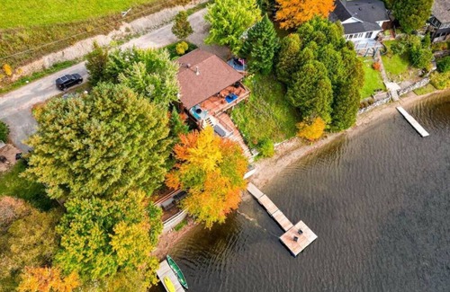 Saint-Andre-Avellin House | Waterfront Cottage with Hot Tub and Waterfalls