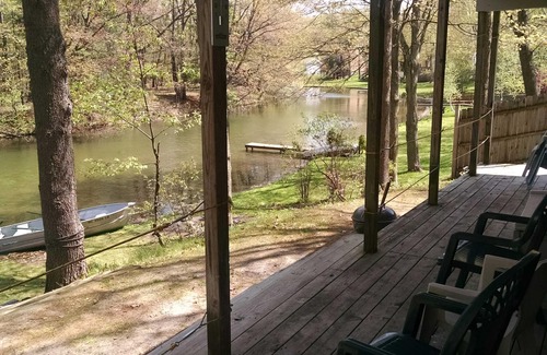 Mears Cottage | Waterfront Cabin on Silver Lake Channel. Canoe and row boat.