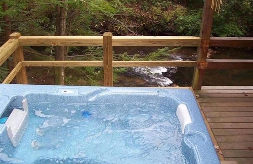 Cashes Valley Cabin | Waterfront Cabin on Trout Stream W/Hot Tub, & Internet