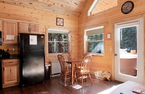 South Fork Cabin | Waterfront cabin with bridge, private hot tub, & WiFi - near National Forest