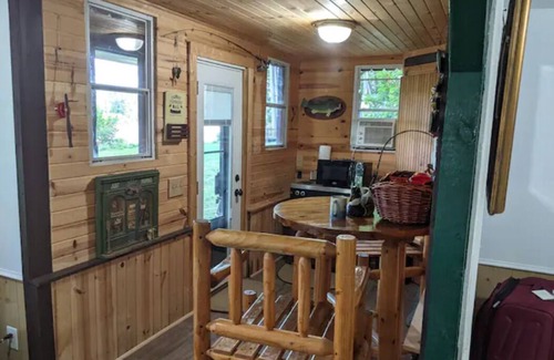 Colton House | Waterfront Cabin with Hot Tub! Free Kayaks & Canoes, Fishing Boats, & Bicycles!