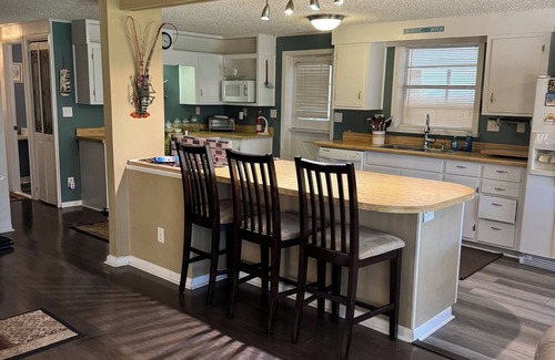 Indian Harbor Estates House | Waterfront Canal Cottage -Fisherman's Paradise w/25 ft dock