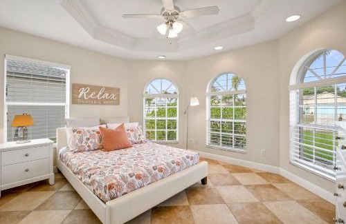 Pelican House | Waterfront Canal Home with HTD Pool Spa and Kayaks