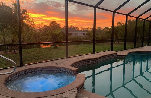South Gulf Cove House | Waterfront Canal/Palms Oasis in South Gulf Cove