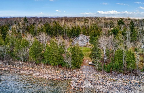 Manitoulin District House | Waterfront, chalet style home; minutes walk to the beach