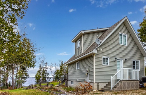 Manitoulin District House | Waterfront, chalet style home; minutes walk to the beach
