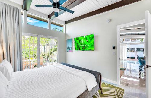 Coral Ridge Villa | Waterfront Compound 2 Heated Pools SaltAire Lime Keys