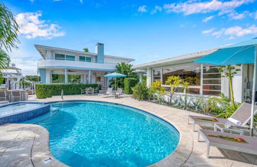 Coral Ridge Villa | Waterfront Compound 2 Heated Pools SaltAire Lime Keys