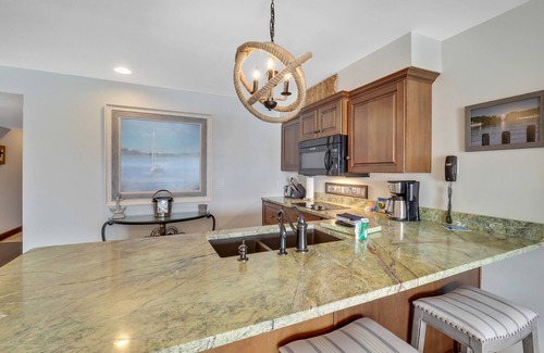 Charlevoix Condo | Waterfront Condo | Amazing Balcony Views | Pool, Hot Tub, Sauna | Sleeps 4