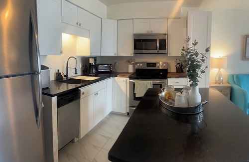 Englewood Condo | Waterfront Condo on Lemon Bay, Steps from Beach - Pool, Boat Dock