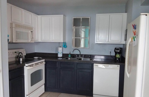 Coquina Key Condo | Waterfront Condo, enjoy your morning coffee while watching the dolphins!