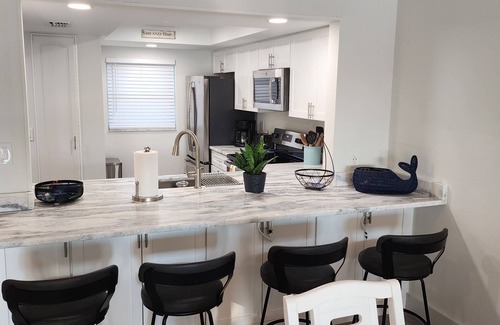 Tierra Verde Condo | Waterfront condo newly remodeled and furnished. Community pool and tennis court.