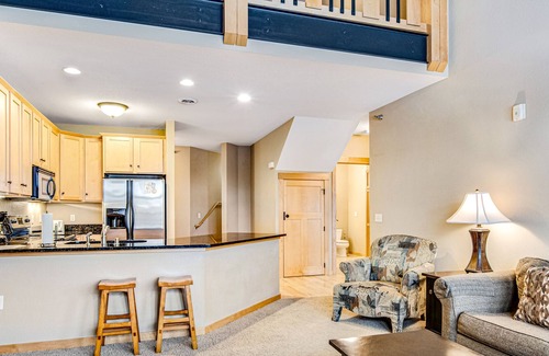 Three Lakes Condo | Waterfront condo with loft, washer/dryer, fireplace, balcony, pools, & hot tubs